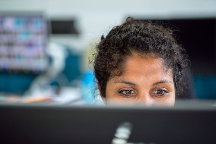 woman software engineer writing code